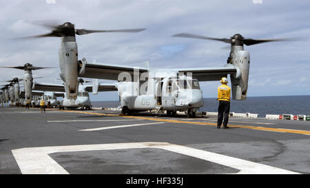Eight U.S. Marine Corps MV-22B Ospreys prepare for liftoff during flight operations on the USS Bonhomme Richard (LHD 6), at sea, March 13, 2015. The Ospreys are with Marine Medium Tiltrotor Squadron (VMM) 262 (Reinforced), 31st Marine Expeditionary Unit (MEU). VMM-262 (REIN) is the aviation combat element for the 31st MEU. The 31st MEU is participating in amphibious integration training with the Bonhomme Richard Amphibious Ready Group during their Spring Patrol of the Asia-Pacific region. (U.S. Marine Corps photo by Staff Sgt. Joseph DiGirolamo/Released) Ospreys Transport Marines to Airfield S