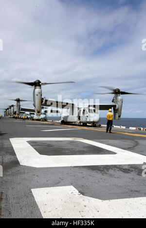 Eight U.S. Marine Corps MV-22B Ospreys prepare for liftoff during flight operations on the USS Bonhomme Richard (LHD 6), at sea, March 14, 2015. The Ospreys are with Marine Medium Tiltrotor Squadron (VMM) 262 (Reinforced), 31st Marine Expeditionary Unit (MEU). VMM-262 (REIN) is the aviation combat element for the 31st MEU. The 31st MEU is participating in amphibious integration training with the Bonhomme Richard Amphibious Ready Group during their Spring Patrol of the Asia-Pacific region. (U.S. Marine Corps photo by Staff Sgt. Joseph DiGirolamo/Released) Ospreys Transport Marines to Airfield S