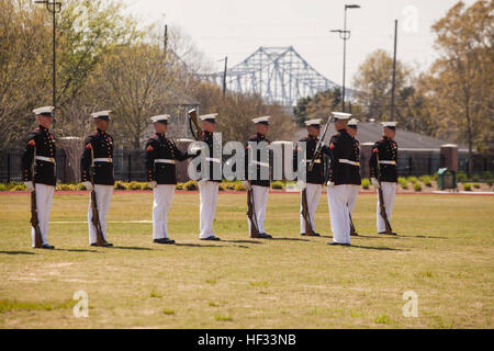 The United States Marine Corps Silent Drill Platoon performs close order drill during The Battle Color Ceremony on the parade field, at Marine Corps Support Facility New Orleans, La., March 17, 2015. The platoon is based out of the historic Marine Barracks, Washington, D.C., and is currently on tour. (U.S. Marine Corps Photo by Lance Cpl. Ricardo Davila/Released) Battle Color Ceremony 150317-M-YF952-248 Stock Photo