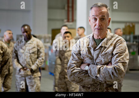 Gen. Joseph Dunford, Commandant of the Marine Corps, and Sgt. Maj. Ronald Green, Sergeant Major of the Marine Corps, paid a visit to the service members aboard Marine Corps Air Station Iwakuni, Japan, March 24, 2015. During their visit, Dunford and Green conducted an all-hands brief and toured some of the units aboard station including Marine All-Weather Fighter Attack Squadron 242 and Marine Aviation Logistics Squadron 12. Dunford also spoke to service members about the issues pertaining to the current state of the Marine Corps and his plans to improve it while fielding questions the service  Stock Photo