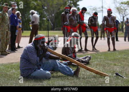 Australian natives, known as Aborigines, play traditional music and perform dances for the U.S. Marines of 1st Battalion, 4th Marine Regiment, Marine Rotational Force – Darwin, during a “Welcome to Country” brief at the Brigade Parade Ground April 22 at Robertson Barracks. The Marine Corps and the Australian Defence Force are committed to continuing our tradition of more than 100 years of global partnerships and security cooperation between Australia and the United States of America. U.S. military-ADF relations date back to the early 20th century and include significant conflicts World Wars I  Stock Photo
