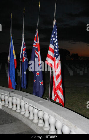 A crowd of more than 150 gathered this morning at Clark Veterans Cemetery, Angeles City, Philippines, to commemorate the 100th anniversary of ANZAC Day, April 25. Veterans and serving members from Australia, New Zealand, the United States and the Philippines, joined together to remember Gallipoli and to recognize the sacrifices of those serving today. Numbers were bolstered by service men and women from Exercise Balikatan 15 based at Clark, including Royal Australian Air Force, Australian Army, U.S. Marine Corps and Philippine Army. The event was organized by the Angeles City Sub Branch of the Stock Photo