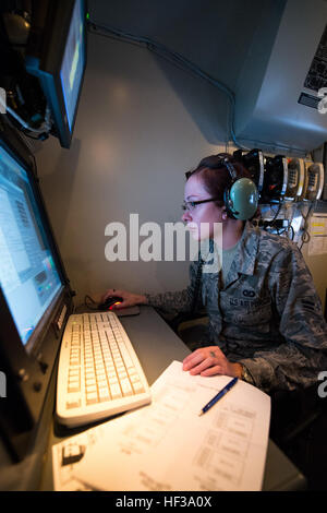 A surveillance technician from the 117th Air Control Squadron, Georgia Air National Guard, monitors radar data emitted from aircraft flying in the Sentry Savannah 15-2 exercise from an operations module at The Air Dominance Center, Savannah, Ga., May 11, 2015. Sentry Savannah is a National Guard Bureau sponsored training event with a focus on Joint Dissimilar Air Combat Training and 5th Generation Fighter Integration. It offers a chance for fighter pilots to participate in war simulations that depict what they would face in real-world scenarios. During the exercise the 283rd CBCS provided NIPR Stock Photo
