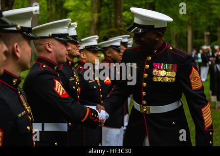 Sergeant Maj. of the Marine Corps Ronald L. Green shakes the hands of Marines with the 5th Marine Regiment prior to a private ceremony at Aisne-Marne American Cemetery in Belleau, France, May 31, 2015. This Memorial Day ceremony is held in honor of the 97th anniversary of the Battle of Belleau Wood. More than 1,800 Marines from the 5th and 6th Regiments lost their lives in the 21-day battle that stopped the last German offensive in 1918. (U.S. Marine Corps photo by Lance Cpl. Akeel Austin/Released) 1st Marine Division commemorates the 97th anniversary of the battle of Belleau Wood 150531-M-JE1 Stock Photo