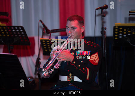 Sgt. Thomas DiOttaviano, a U.S. Marine Corps Forces, Pacific Band Brass Quartet trumpeter, performs at the Ambassador's Residence, June 4, 2015. The Brass Quartet performed for U.S. Embassy staff and Indonesian citizens at an Independence Day performance that is being held a month ahead of time due to the upcoming month of Ramadan. This is the first time that the band has played in Indonesia (U.S. Marine Corps photo by Cpl. Erik Estrada) MARFORPAC Band helps US Embassy Jakarta celebrate 4th of July 150604-M-QQ799-090 Stock Photo