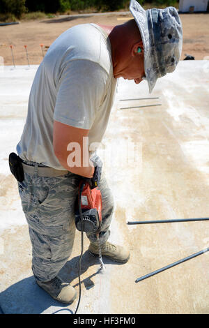 South Carolina Air National Guard heavy equipment operators and civil engineers work with 200th RED HORSE Squadron and U.S. Navy Seabees to install rebar in the foundation of a multipurpose building during Deployment for Training in Israel. Stock Photo