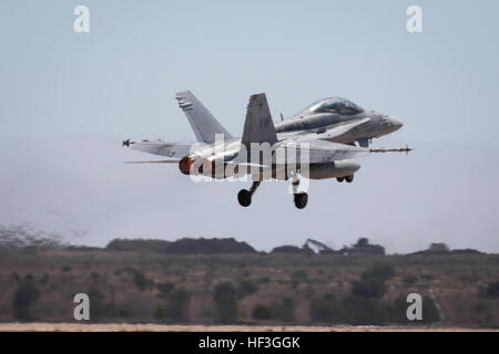 A U.S. Marine F/A-18 Super Hornet assigned to Marine Fighter Attack Squadron (VMFA) 314, Marine Aircraft Group 11, 3rd Marine Aircraft Wing, takes off from Marine Corps Air Station Miramar, San Diego, California, July 14, 2015. (U.S. Marine Corps photo by Cpl. Darien J. Bjorndal, 3rd Marine Aircraft Wing/ Released) F-A-18 Takeoff 150714-M-MF313-002 Stock Photo