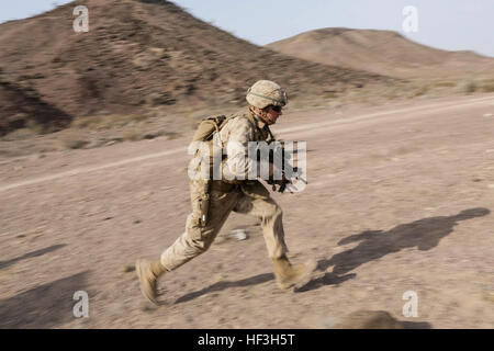 ARTA BEACH, Djibouti (July 22, 2015) A U.S. Marine with Battalion Landing Team 3rd Battalion, 1st Marine Regiment, 15th Marine Expeditionary Unit runs to his throwing position during a grenade accuracy exercise.  Elements of the 15th Marine Expeditionary Unit are ashore in Djibouti for sustainment training to maintain and enhance the skills they developed during their pre-deployment training period.  The 15th MEU is currently deployed in support of maritime security operations and theater security cooperation efforts in the U.S. 5th and 6th Fleet areas of operation. (U.S. Marine Corps photo by Stock Photo