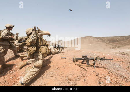 ARTA BEACH, Djibouti (July 22, 2015) A U.S. Marine with Battalion Landing Team 3rd Battalion, 1st Marine Regiment, 15th Marine Expeditionary Unit throws a practice grenade during a grenade accuracy exercise.  Elements of the 15th Marine Expeditionary Unit are ashore in Djibouti for sustainment training to maintain and enhance the skills they developed during their pre-deployment training period.  The 15th MEU is currently deployed in support of maritime security operations and theater security cooperation efforts in the U.S. 5th and 6th Fleet areas of operation. (U.S. Marine Corps photo by Sgt Stock Photo