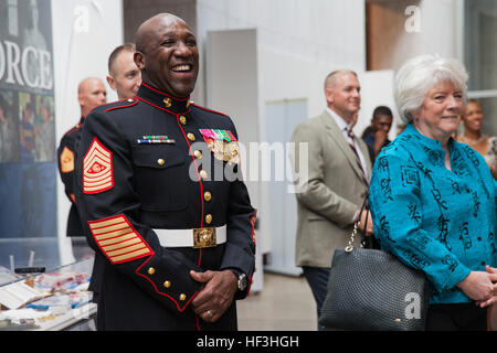 U.S. Marine Corps Sgt. Maj. Ronald L. Green, 18th sergeant major of the Marine Corps, attends the reception before a sunset parade at the Women in Military Service for America Memorial, Arlington, Va., July 28, 2015. U.S. Navy Adm. Harry B. Harris, U.S. Pacific Command, was the guest of honor for the parade, and Gen. John M. Paxton, assistant commandant of the Marine Corps, was the hosting official. Since September 1956, marching and musical units from Marine Barracks Washington, D.C., have been paying tribute to those whose “uncommon valor was a common virtue” by presenting sunset parades in  Stock Photo