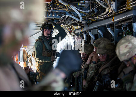 U.S. Marines with Special-Purpose Marine Air-Ground Task Force-Crisis Response-Africa and U.K. Royal Marines with 45 Commando board a MV-22B Osprey during a combined operation part of exercise Blue Raptor, Nov. 20, 2015. The Allied Maritime Basing Initiative is a proof-of-concept to provide the U.S. and NATO allies a year-round, maritime-based crisis response force by leveraging the amphibious capabilities residing in Europe. (U.S. Marine Corps photo by Staff Sgt. Keonaona C. Paulo/Released) Blue Raptor 151120-M-EF955-067 Stock Photo