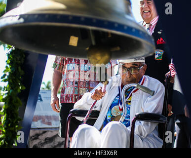 PEARL HARBOR (Dec. 6, 2016) Ray Chavez, 104, the oldest living Pearl Harbor survivor, rings the Freedom Bell during the Freedom Bell Opening Ceremony and Bell Ringing at the USS Bowfin Submarine Museum & Park on Pearl Harbor, Hawaii. Civilians, veterans, and service members came together to remember and pay their respects to those who fought and lost their lives during the attack on Pearl Harbor. (U.S. Marine Corps photo by Cpl. Wesley Timm/Released) 161206-M-AR450-2089 Join the conversation: http://www.navy.mil/viewGallery.asp http://www.facebook.com/USNavy http://www.twitter.com/USNavy http: Stock Photo