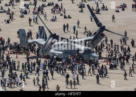 Japanese locals view static displays of F/A-18C/D, AV-8, MV-22, and KC-130J from the U.S. Marine Corps’ III Marine Expeditionary Force, KC-135, E-3, UH-1, F/A-18E, EA-18G, and furthermore, A-10 and F-16 from U.S. forces in Korea during Friendship Day at Marine Corps Air Station Iwakuni, Japan, May 5, 2016. MCAS Iwakuni's aviation friends with the Aircraft Owners and Pilots Association Japan offered static displays, which included such classics as WACO biplanes. (U.S. Marine Corps photo by Cpl. Nathan Wicks/Released) MCAS Iwakuni 40th Friendship Day 160505-M-XD442-064 Stock Photo