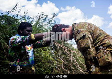 Australian Army soldier Lt. David Hasler receives a welcome to country during Exercise Kowari in the Northern Territory, Australia, August 31, 2016. The purpose of Exercise Kowari is to enhance the United States, Australia, and China’s friendship and trust, through trilateral cooperation in the Indo-Asia-Pacific region. (U.S. Marine Corps photo by Lance Cpl. Osvaldo L. Ortega III) 160831-M-YN982-144 (29417883831) Stock Photo