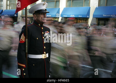 Joe Ollerenshaw, a Korean war veteran and member of the Leatherneck Pipes &amp; Drums, stands at attention waiting his unit's turn to step off and march in the 249th  St. Patrick's Day Parade here, March 17. A contingent of more than 300 Marines, including the Quantico Marine Corps Band, ceremonial marchers from Marine Barracks Washington, active and reserve Marines and Marine Corps League members from the New York area, marched in honor of Grand Marshal Raymond W. Kelly, New York City Police Commissioner and retired Marine Corps colonel. New York City St. Patrick's Day Parade DVIDS261047 Stock Photo