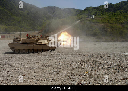 Marines with Company A, 4th Tank Battalion, 4th Marine Division, Marine Forces Reserve fire the main guns of their M1A1 Abrams tanks April 25 at Suseong-ri Firing Range. The live-fire was conducted as part of Korean Marine Exchange Program 13-7, which is one of three KMEPs taking place during the exercise Ssang Yong 13. Ssang Yong, which means 'twin dragons,' is an annual exercise designed to enhance the interoperability of both ROK and U.S. forces. (Marine Corps photo by Lance Cpl. Donald T. Peterson/Released) ROK, US Marines conduct bilateral tank shoot 130424-M-GE767-002 Stock Photo