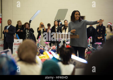 First Lady Michelle Obama gives a speech about the importance of everyone's hard work and the Toys for Tots program at Joint Base Anacostia-Bolling Washington D.C., Dec. 7, 2016. The Marine Corps Reserve Toys for Tots program was created in 1947 and provides new, unwrapped toys to millions of children across the country every year. The first lady is an avid supporter of Toys for Tots and has been a spokesperson for its mission for the last eight years. (U.S. Marine Corps photo by Lance Cpl. Jamie L. Arzola) Michelle Obama's last Toys for Tots as FLOTUS 161207-M-TB374-002 Stock Photo