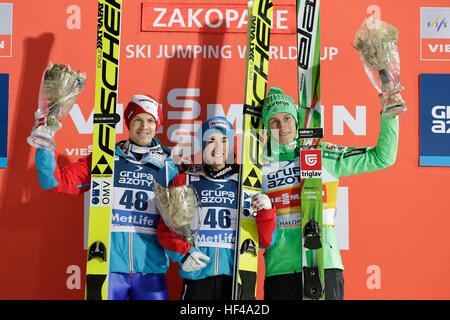 ZAKOPANE, POLAND - JANUARY 24, 2016: FIS Ski Jumping World Cup in Zakopane o/p  Michael Hayboeck Austria, Stefan Kraft Austria, Peter Prevc Slovenia