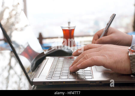 Businessman working with laptop Computer Stock Photo