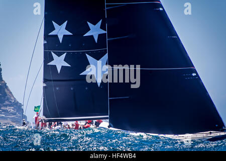 Sydney, Australia. 26th Dec, 2016. Anthony Bell's 'Perpetual Loyal' pictured following the start of the Rolex Sydney Hobart Yacht Race with the firing of a starting cannon at 1.00pm in Sydney Harbour on Boxing Day, 26 December. © Hugh Peterswald/Pacific Press/Alamy Live News Stock Photo
