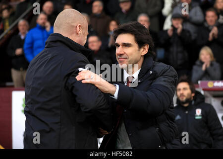 Burnley manager Sean Dyche (left) and Middlesbrough manager Aitor Karanka shake hands before kick off during the Premier League match at Turf Moor, Burnley. Stock Photo