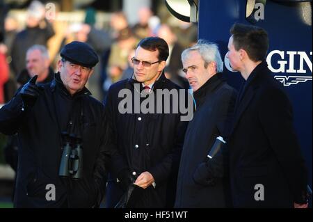 Owner JP McManus watches Thistlecrack win the King George Chase VI at Kempton on the big TV screen with trainer Aidan O'Brien (second left), jockey Ruby Walsh (second right) and trainer Joseph O'Brien during day one of the Christmas Festival at Leopardstown Racecourse. Stock Photo