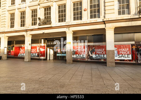 Half price sale posters in windows at Debenhams. In Nottingham, England. On 26th December 2016. Stock Photo