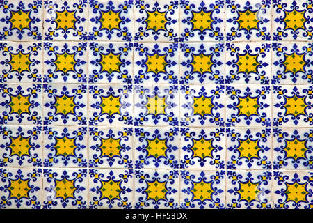 Typical Portuguese old ceramic wall tiles (Azulejos) on the building exterior, Portugal Stock Photo