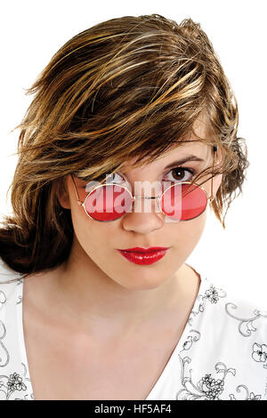 Young woman wearing pink sun glasses Stock Photo