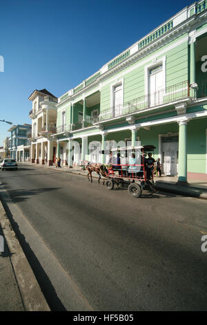 Colonial-style building lining a street in Cienfuegos, Cuba, Caribbean, Americas Stock Photo