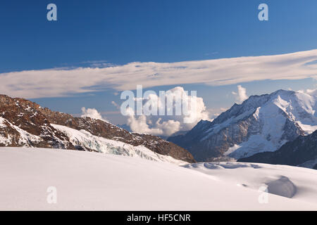 View from Jungfraujoch in Switzerland on a sunny day. Stock Photo