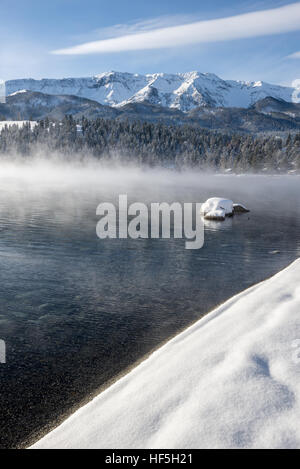 Wallowa Lake steaming on a cold winter morning, Wallowa Valley, Oregon. Stock Photo