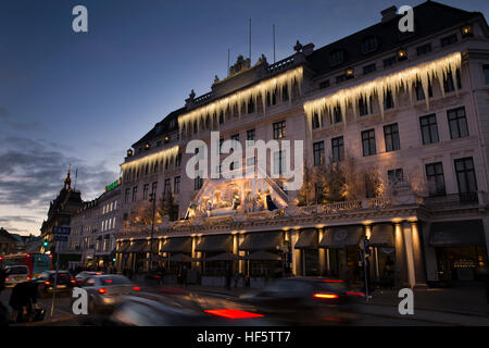 Denmark, Copenhagen, Kongens Nytorv, Hotel, d’Angleterre, nutcracker themed Christmas decorations at dusk Stock Photo