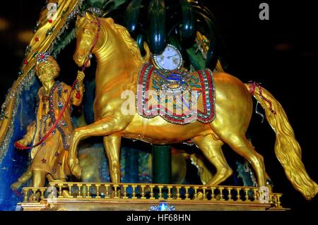 Beijing, China - May 2, 2005:  Gilded horse is one of the treasures on display in the Hall of Clocks Museum of the Forbidden City Stock Photo