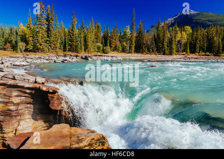 Athabasca Falls is a waterfall in Jasper National Park on the upper Athabasca River, approximately 30 kilometres south of the townsite of Jasper, Albe Stock Photo