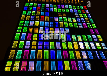 Colored windows texture. Windows illuminated by neon lights background ...