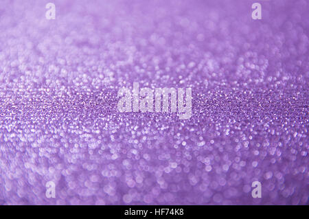 Abstract violet bokeh. Conception of Christmas background. Stock Photo
