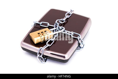 Portable hard drive disk and combination lock padlock. Data security concept Stock Photo