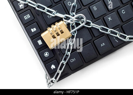 Locked chain on computer keyboard. Concept of security Stock Photo