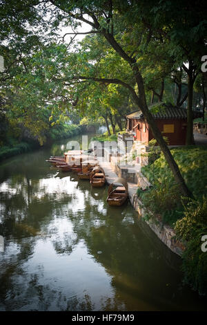 Boats moored to landing in Suzhou, China Stock Photo