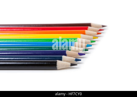 Colored Pencils in order of rainbow on white background Stock Photo