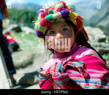 Portrait of a Peruvian girl dressed in colorful traditional handmade outfit. October 21, 2012 - Patachancha, Cuzco, Peru Stock Photo