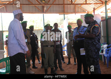 ACP Francis Ayitey Aryee, the African Union Mission in Somalia (AMISOM) Police Training and Development Coordinator (front right), who is also a member of the Somali Election Security Task Force,  and Mohamed Abdinor Ahmed, the Jubbaland Task Force Officer (left), in Kismaayo, Somalia, to assess the security of the polling centres on November 07, 2016. / Awil Abukar Stock Photo