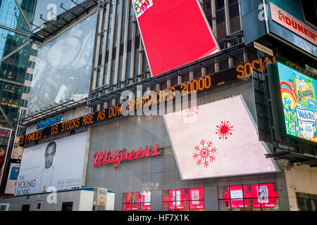 The news ticker in Times Square in New York on Tuesday, December 20, 2016 informs readers that the Dow Jones Industrial Average approached 20,000. (© Richard B. Levine) Stock Photo