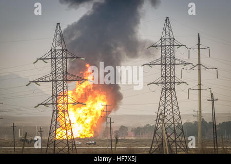 Baku, Azerbaijan. 27th Dec, 2016. Villas suffer as a result of Gas Pipeline Explosion. An explosion took place on the morning of December 27 at the two strands of a gas pipeline with a diameter of 1,000-2,000 mm on the 43rd kilometer of the highway Baku-Alat. After the explosion, a fire broke out, there were no injuries, and work began to extinguish the fire. There are no threats to the nearby residential facilities, according to the Ministry of Emergency Situations. © Aziz Karimov/Pacific Press/Alamy Live News Stock Photo