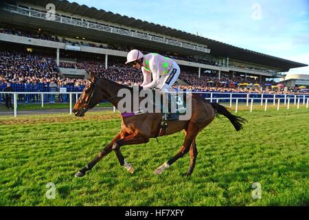 Douvan ridden by Ruby Walsh win the Paddy Power Cashcard Chase during day two of the Christmas Festival at Leopardstown Racecourse. Stock Photo