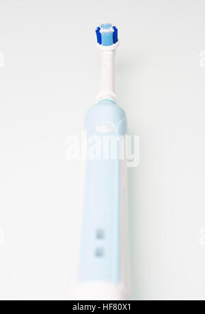 new electric toothbrush on the table Stock Photo - Alamy