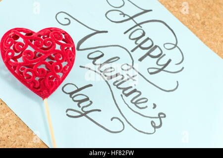 Happy Valentines day calligraphy card with heart shaped decoration Stock Photo