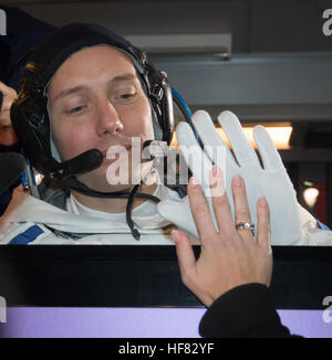 Expedition 50 ESA astronaut Thomas Pesquet waves farewell to friends and family as he and NASA astronaut Peggy Whitson, and Russian cosmonaut Oleg Novitskiy of Roscosmos depart building 254 a few hours ahead of their launch, Thursday, Nov. 17, 2016, in Baikonur, Kazakhstan.  Whitson, Novitskiy, and Pesquet launched in their Soyuz MS-03 spacecraft to the International Space Station to begin a six-month mission. Victor Zelentsov) Stock Photo