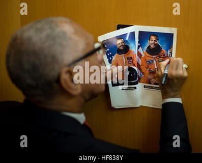 NASA Administrator Charles Bolden signs an autograph while at the Operations Support Building II (OSB II) while attending prelaunch activities for NASA's Origins, Spectral Interpretation, Resource Identification, Security-Regolith Explorer (OSIRIS-REx) mission on Thursday, Sept. 8, 2016 at NASA's Kennedy Space Center in Florida. The two hour launch window opens tonight at 7:05pm ET. OSIRIS-REx will be the first U.S. mission to sample an asteroid, retrieve at least two ounces of surface material and return it to Earth for study. The asteroid, Bennu, may hold clues to the origin of the solar sys Stock Photo